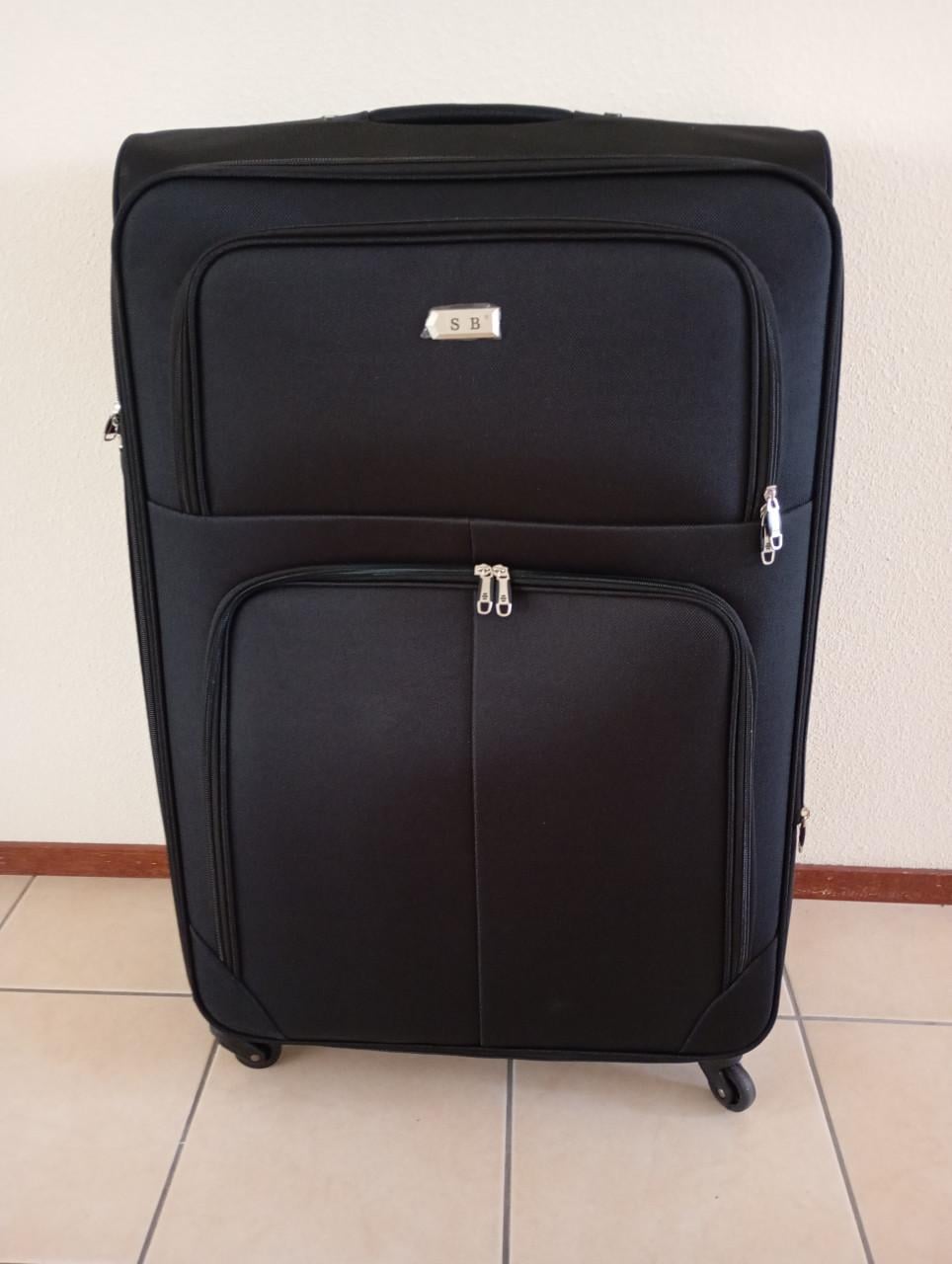 Stevige zwarte koffervan het merk S B