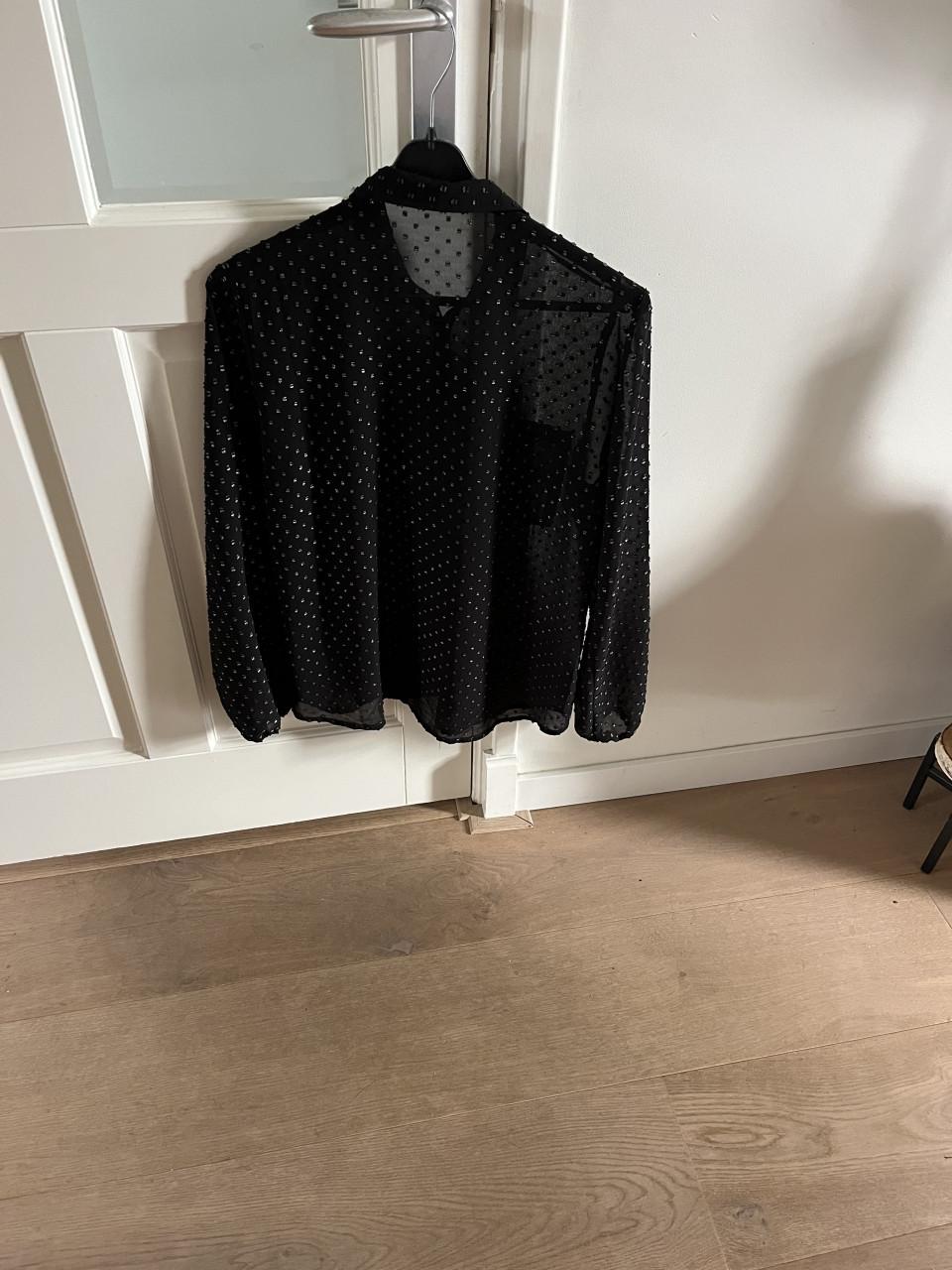 Zwarte doorschijnende García blouse