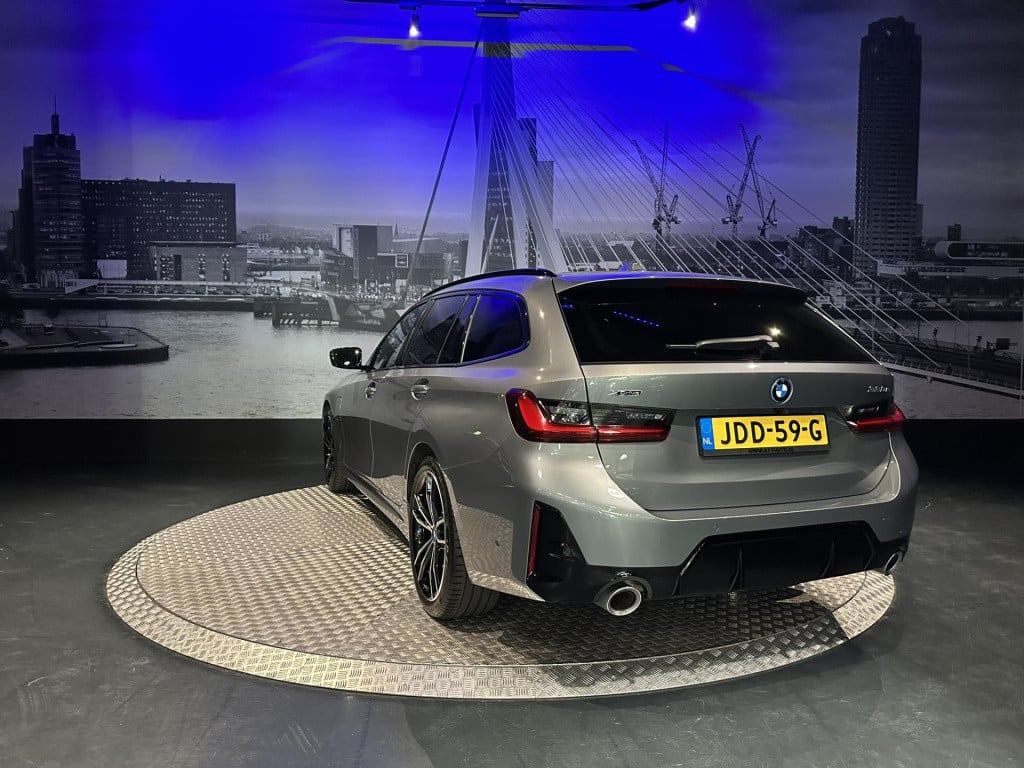 BMW 3-serie touring 330e xdrive *pano*360camera*sportstoelen*laser*