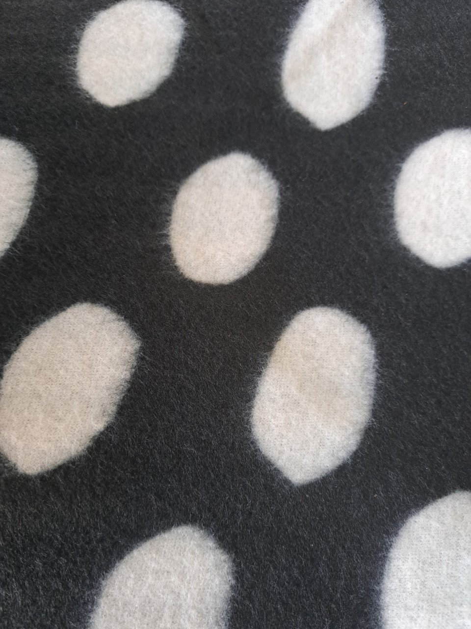 Kleed fleece kunststof zwart/wit