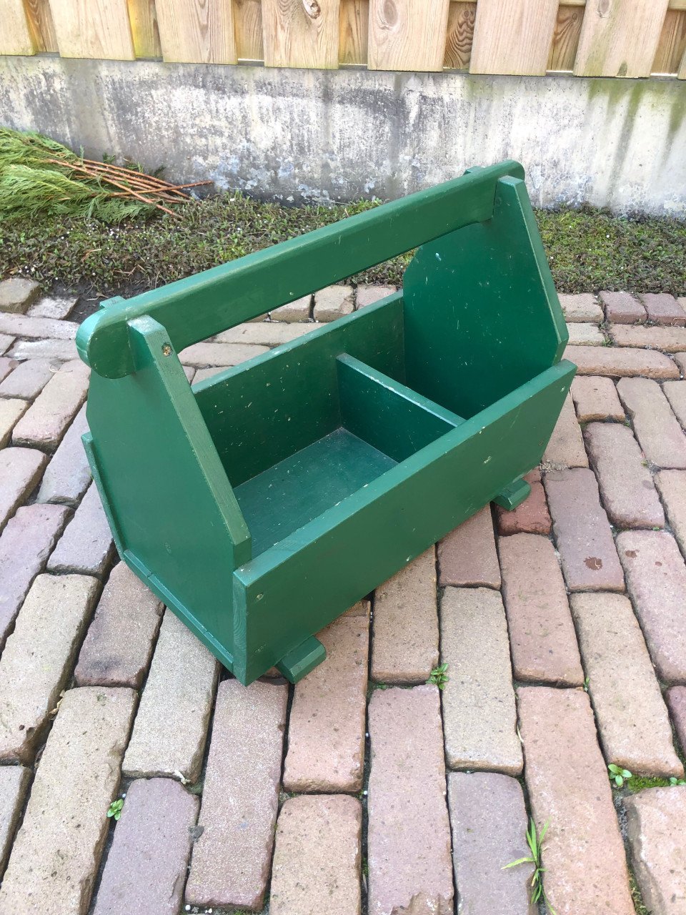 Groene houten bak.
