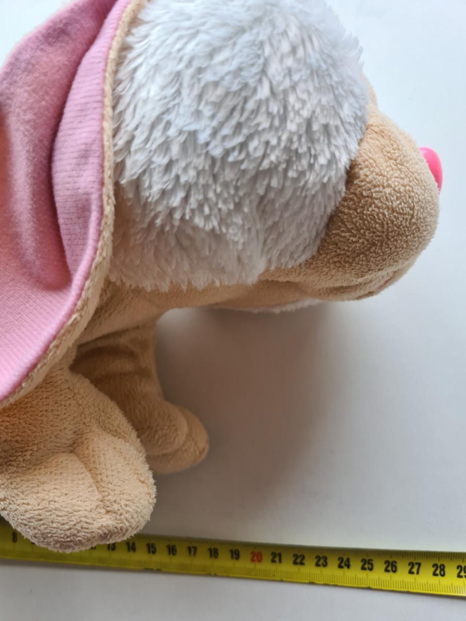 Deze schattige knuffel hond is in uitstekende staat, zo goed als nieuw.