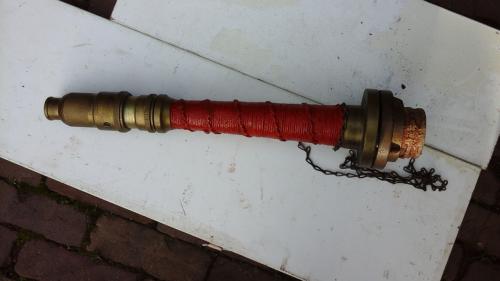 Koperen brandweerspuit