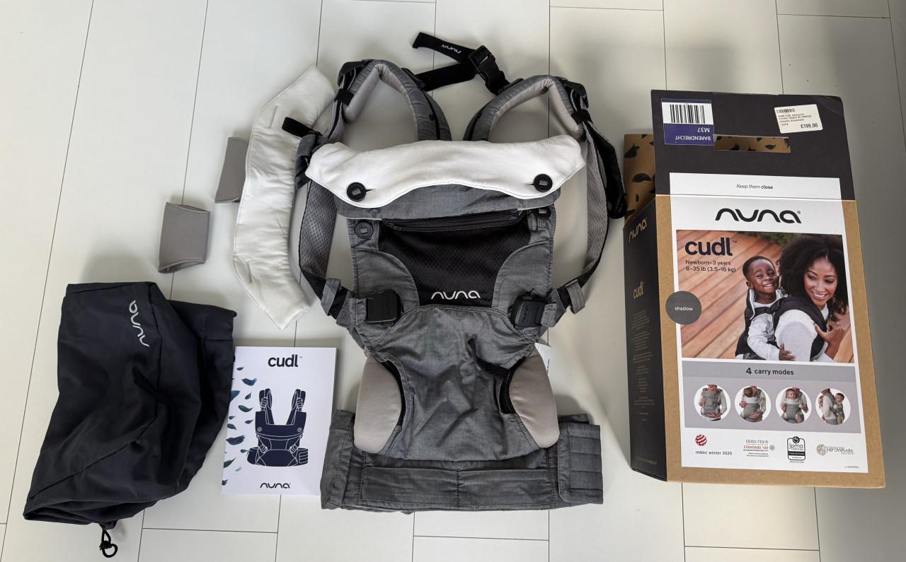 Nieuwstaat: Nuna Cudl draagzak, compleet