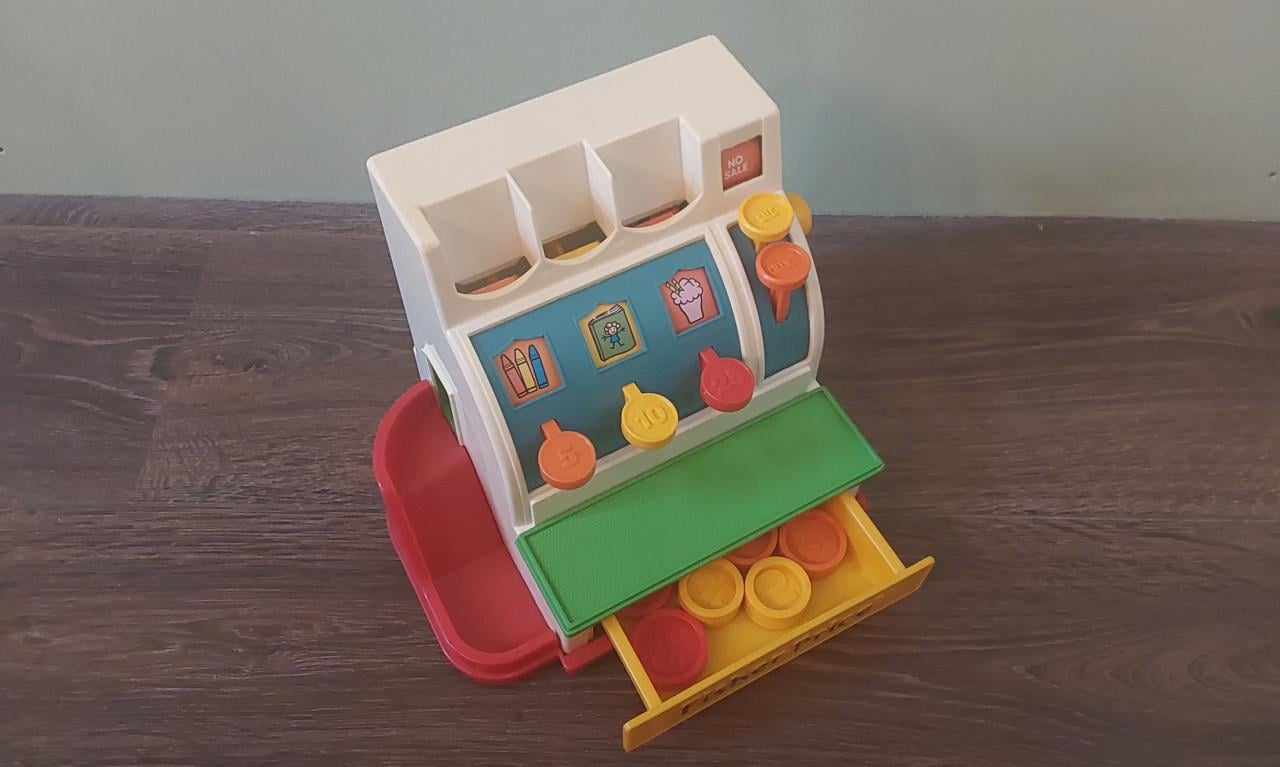 Originele Fisher Price kassa met 6 munten