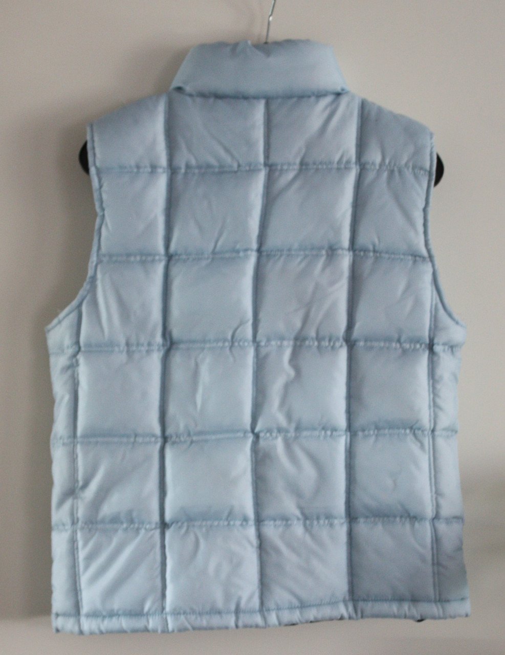 Licht blauwe bodywarmer maat s