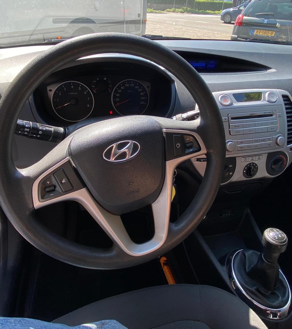 🚗 Hyundai i20 1.2i i-Motion | 52.370km! | Trekhaak | Airco | apk +garantie