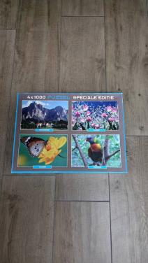 😊4 puzzels van 1000 stukjes in 1 doos.