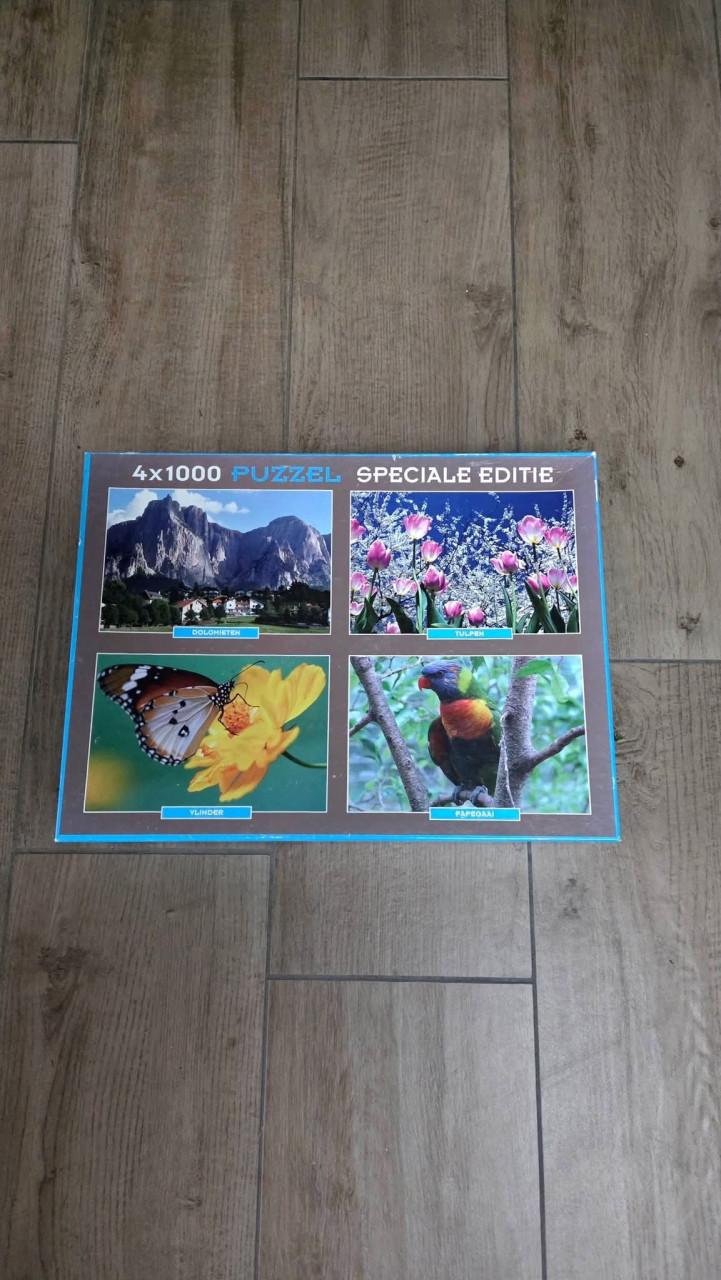 😊4 puzzels van 1000 stukjes in 1 doos.