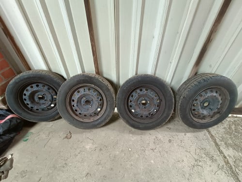 Set stalen velgen met band (4x100) 15 inch
