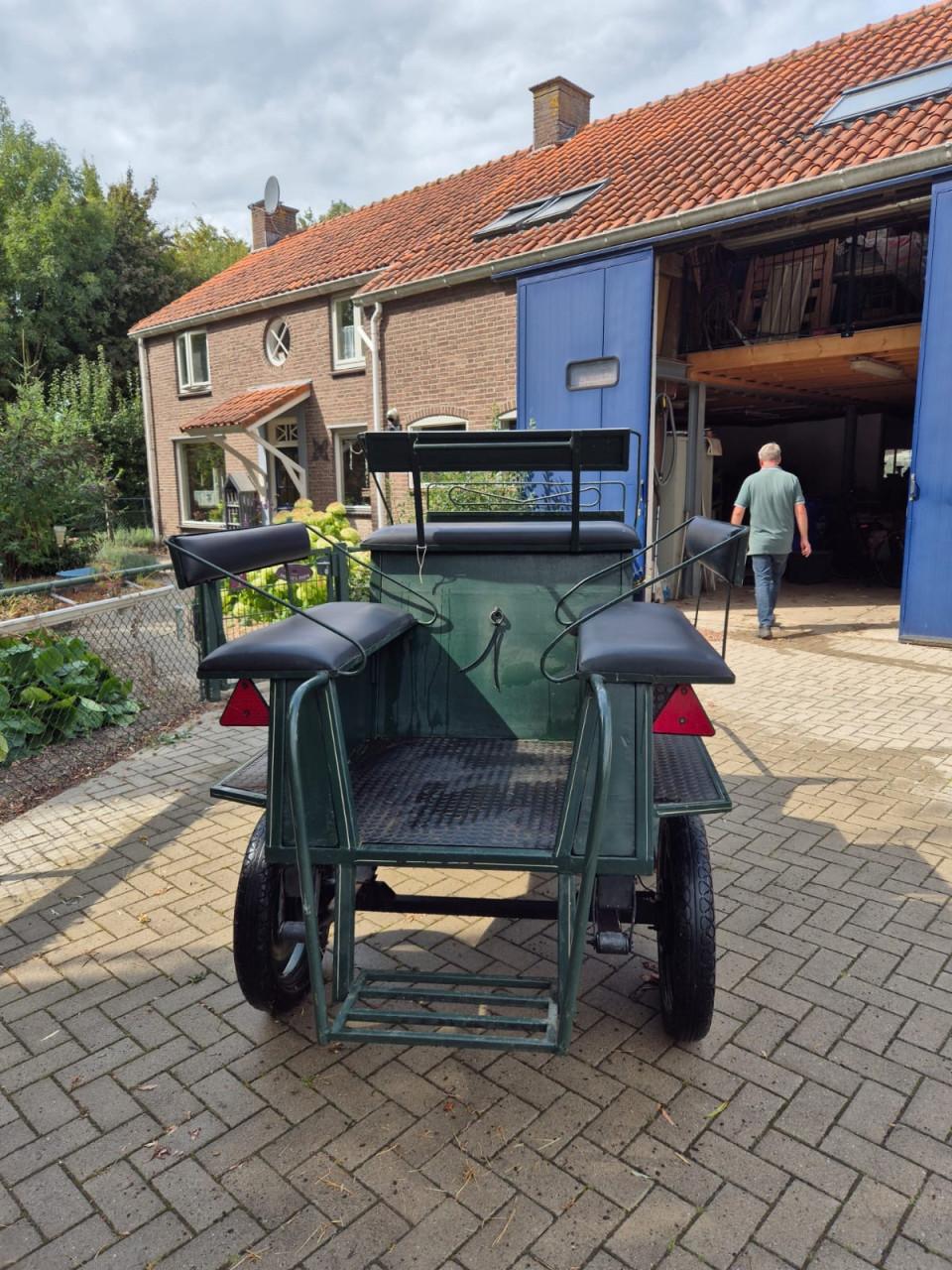 Menwagen met tuig