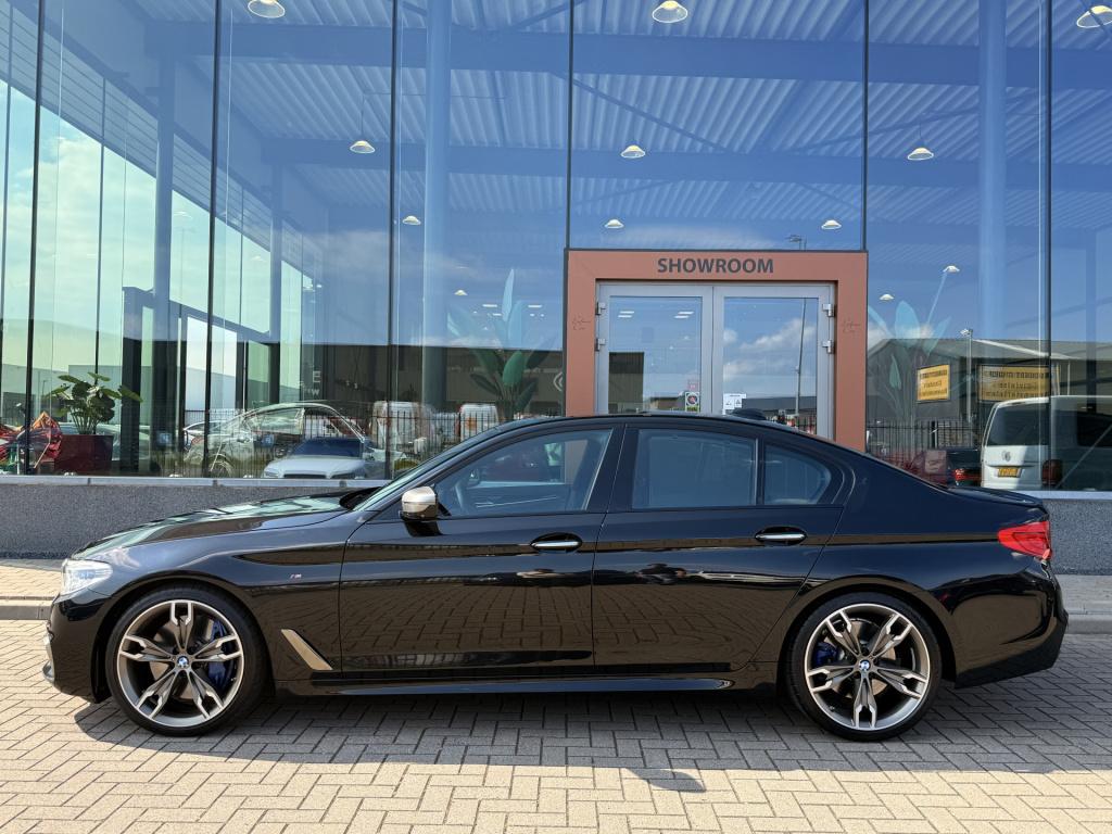 BMW 5 Serie m550i xdrive high executive | 4ws | soft-close | pano | b&w | m