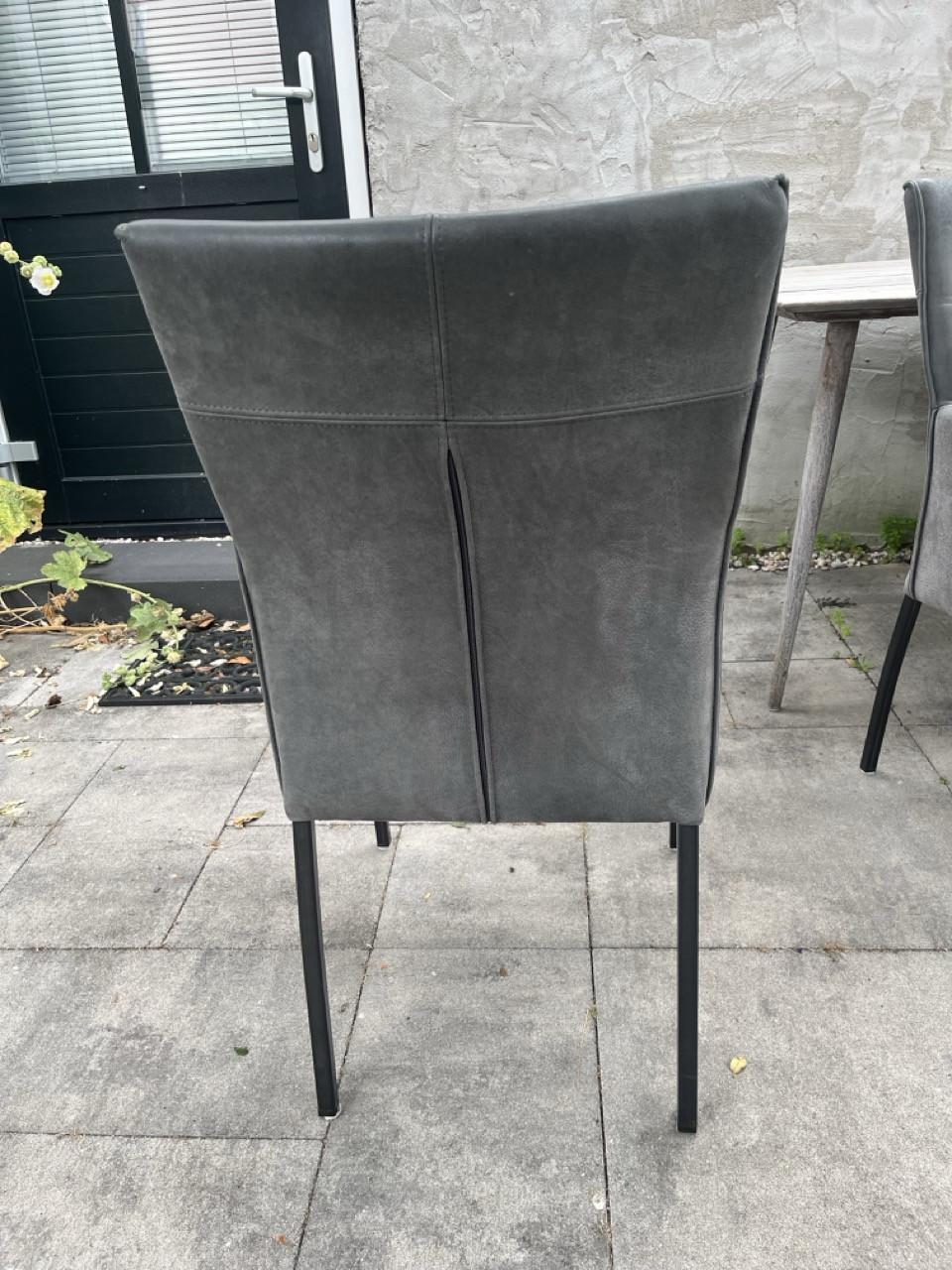 Set van 4 lederen eetkamerstoelen