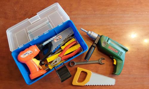 Speelgoed gereedschapskoffer met diverse gereedschap en extra gereedschap