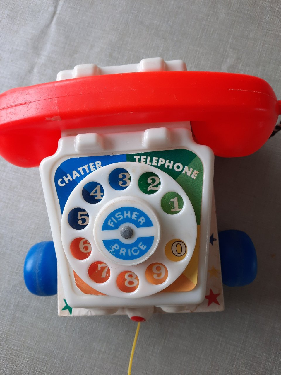 Fisher price telefoon + pluchen baby bal.