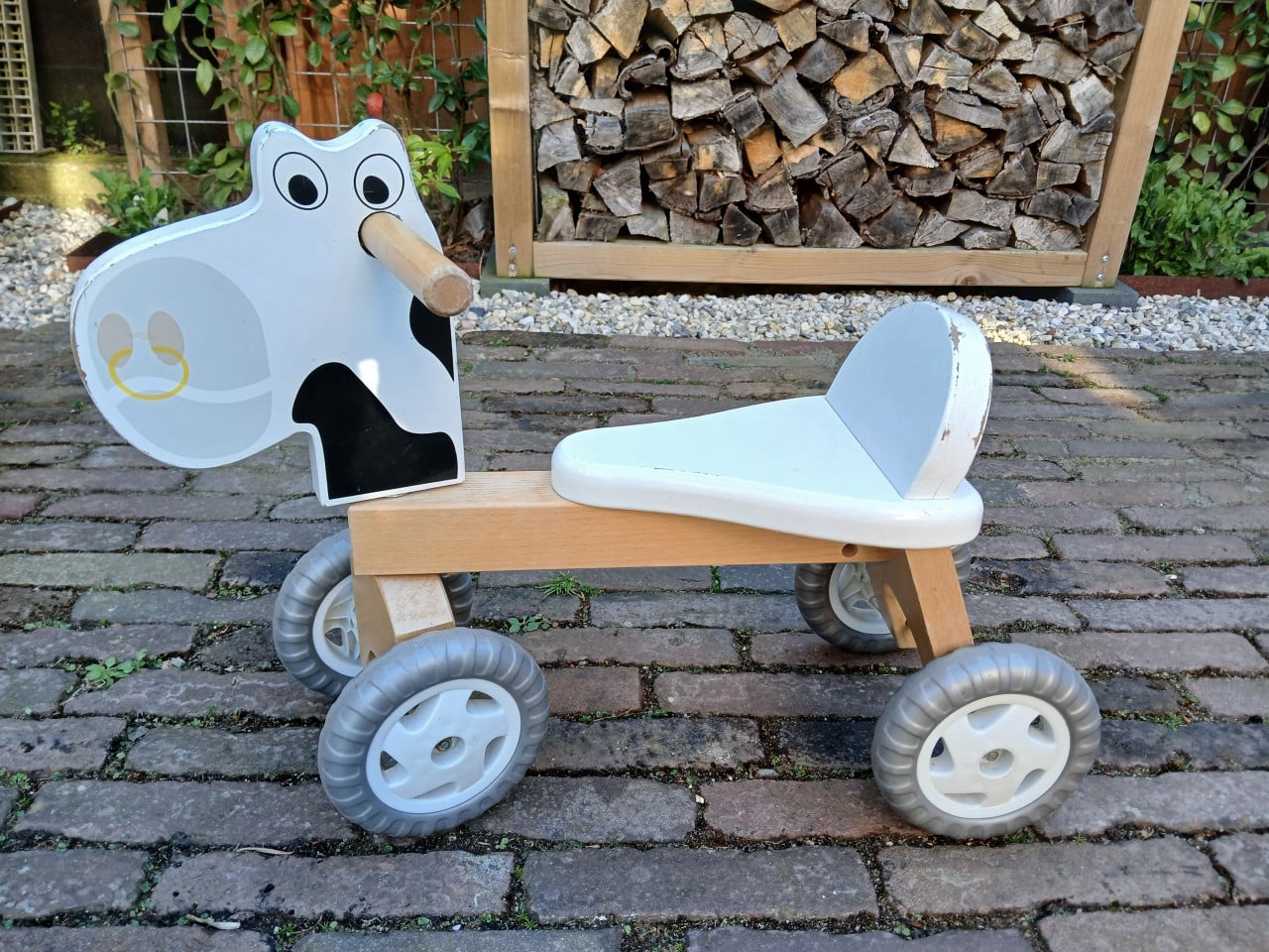 Houten loopfietsje koe