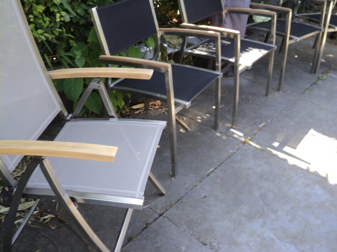 4 Vrijwel nieuwe RVS stoelen stapelbaar