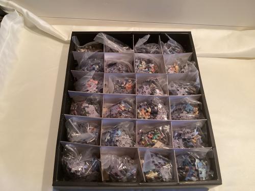 24 puzzeltjes van Wasgij