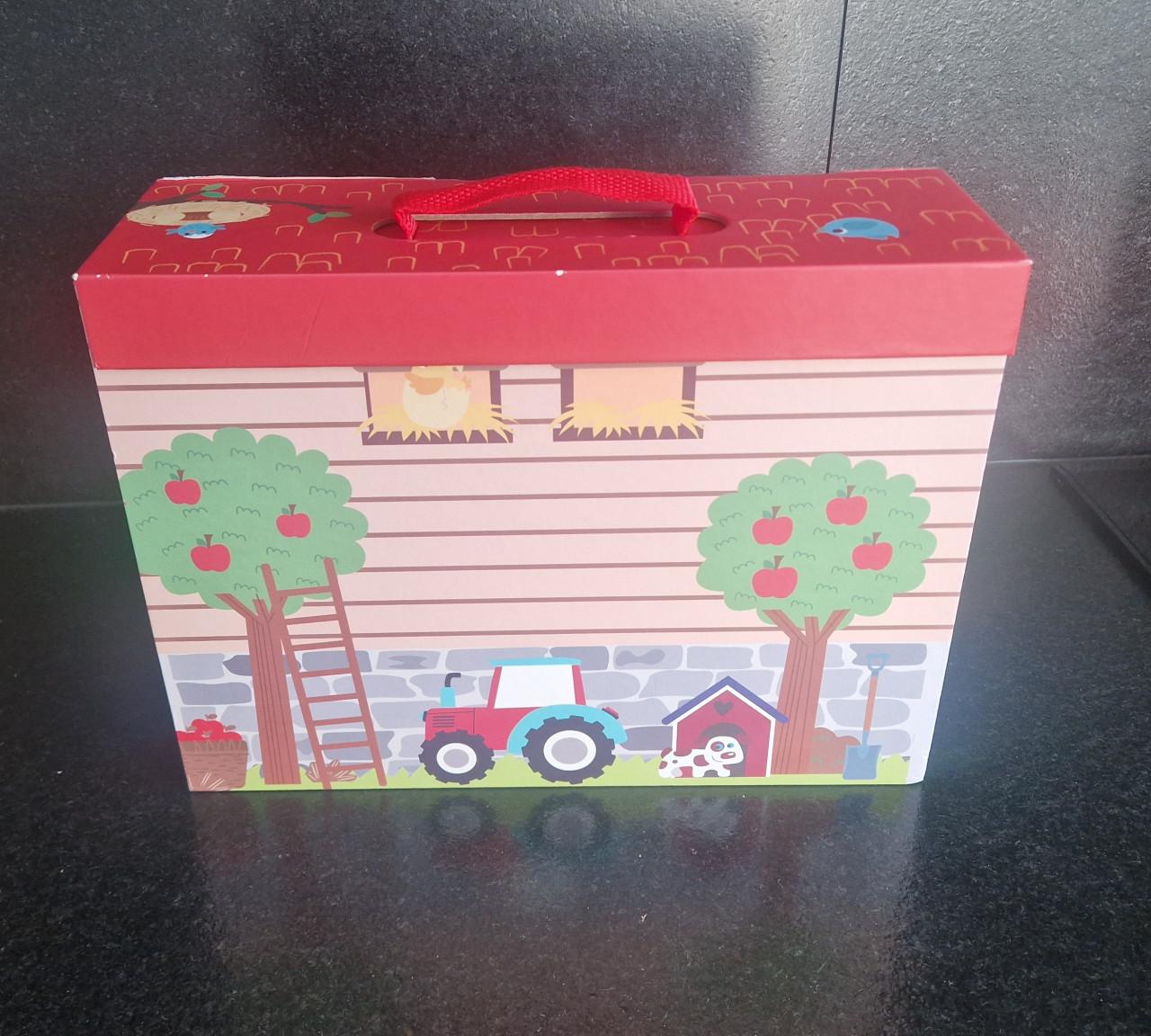 Playtive boerderij speelkoffer met houten figuren.