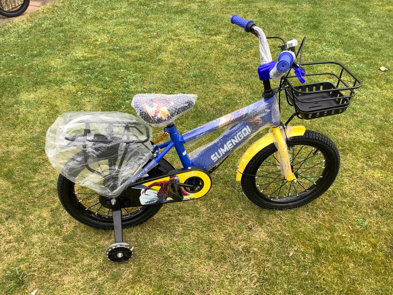 Nieuwe 16 inch jongensfiets met handrem en zijwieltjes voor bodemprijsje