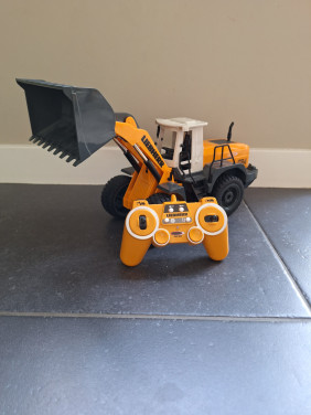 Bestuurbare jamara shovel met trailer