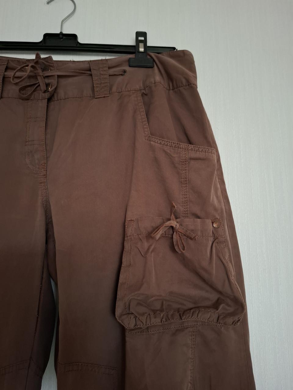 Didi broek met extra zakken en strikdetails. Bruin. Maat 44. Gedragen.