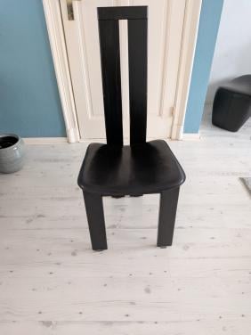 6 zwarte designstoelen met leren zitting