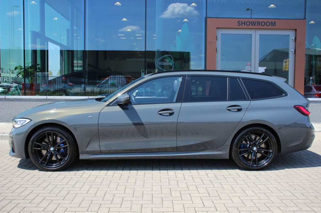 BMW 3-serie touring 320i high executive m pakket | pano | laser | leder