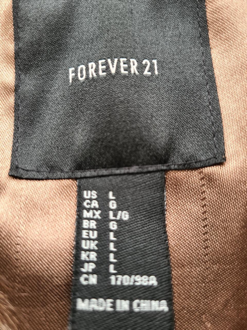 Mooie bruine fake fur lange bodywarmer van Forever21  Maat L