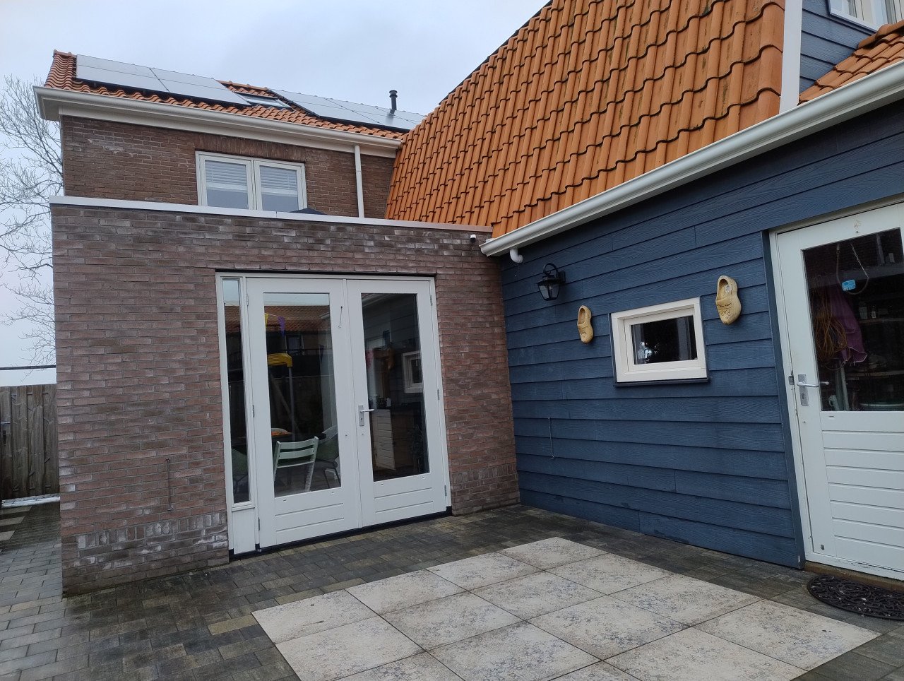 Glazenwasser, zonnepanelen reinigen, overstekken