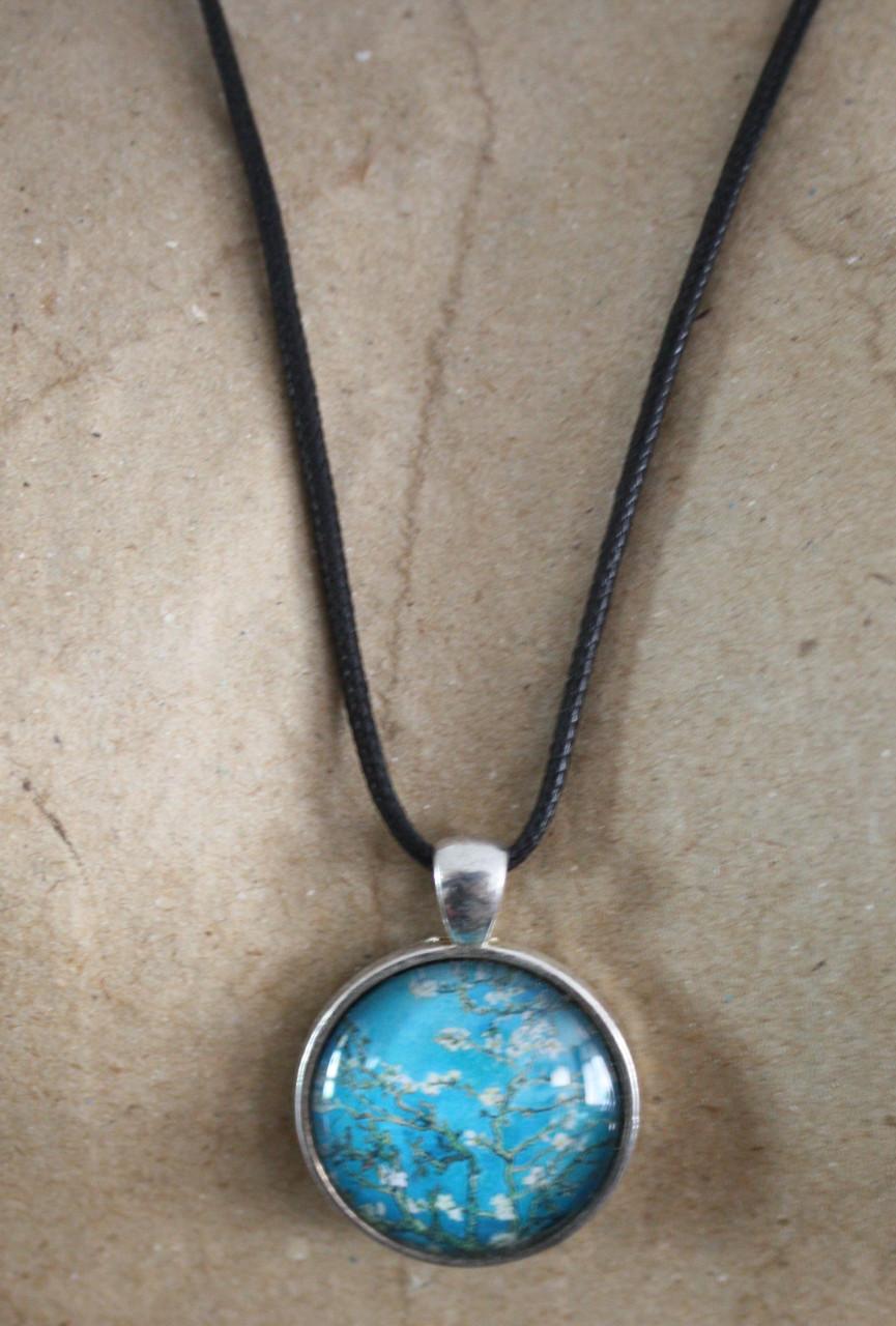 Zwarte toutjes ketting met bloemen hanger