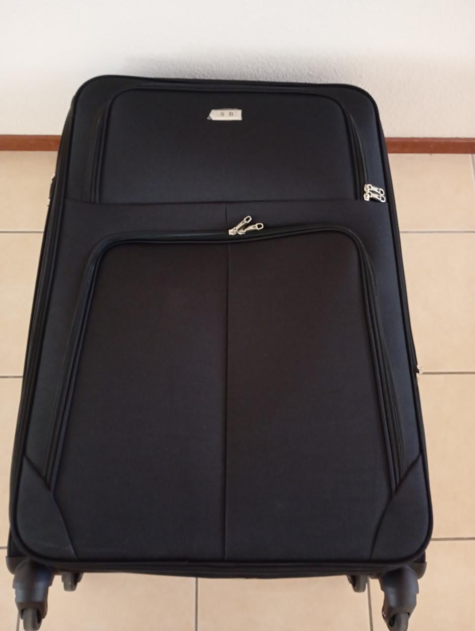 Stevige zwarte koffervan het merk S B