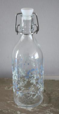 Glazen fles met bloemen print