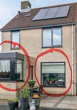 Meranti kozijnen met nieuwe beglazing.