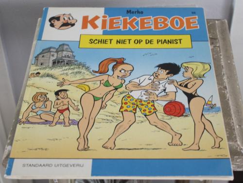Stripboek- kiekeboe schiet niet op de pianist