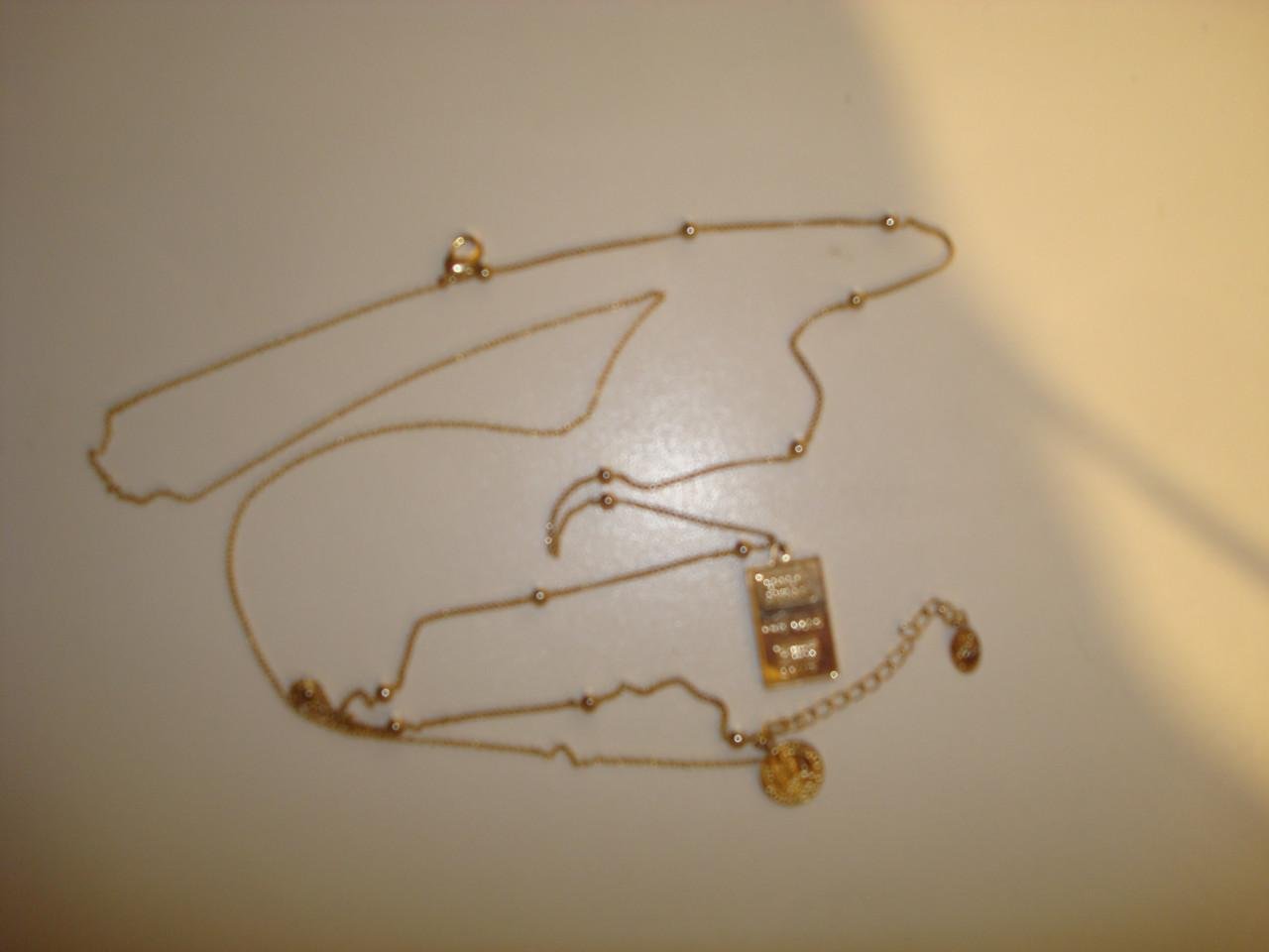 Ketting met baartje goud K 18