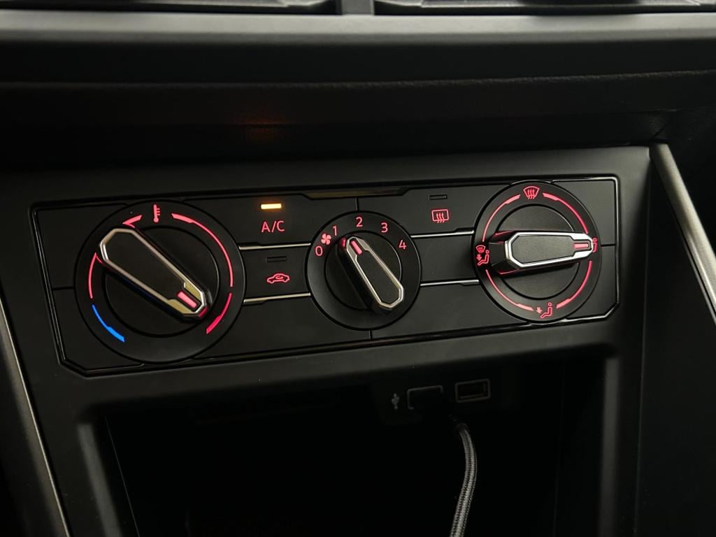 Volkswagen Polo occasion 1.0 tsi comfortline business | wit | airco | tweed