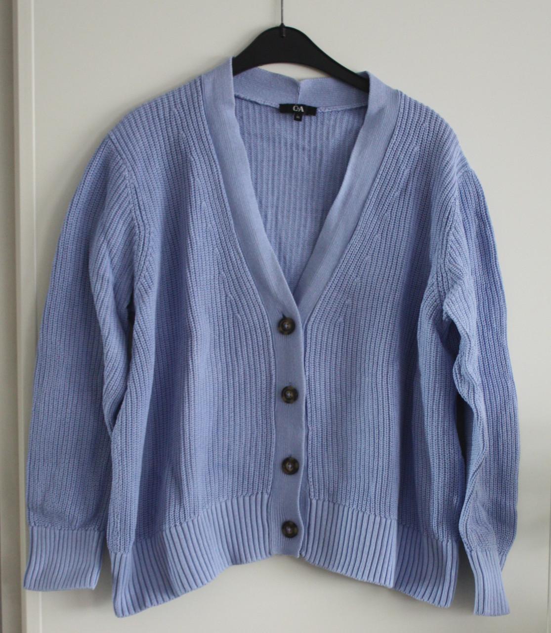 Licht blauwe gebreide vet maat xl