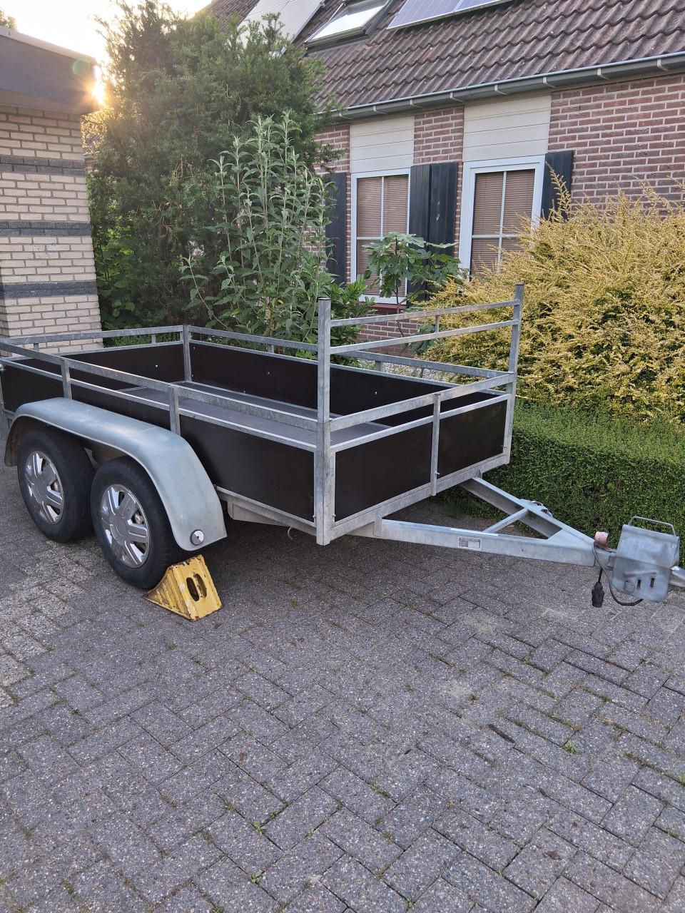 Aanhanger ongeremde tandemasser .
