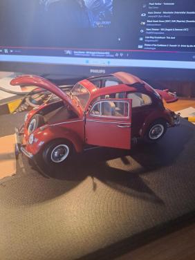 Vw kever met schuifdakje ,1:18