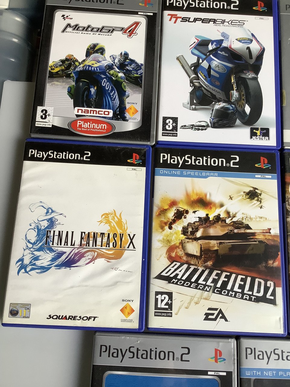 Stapeltje PS2 spellen die ik dubbel heb. Zie je iets wat je wilt overnemen,