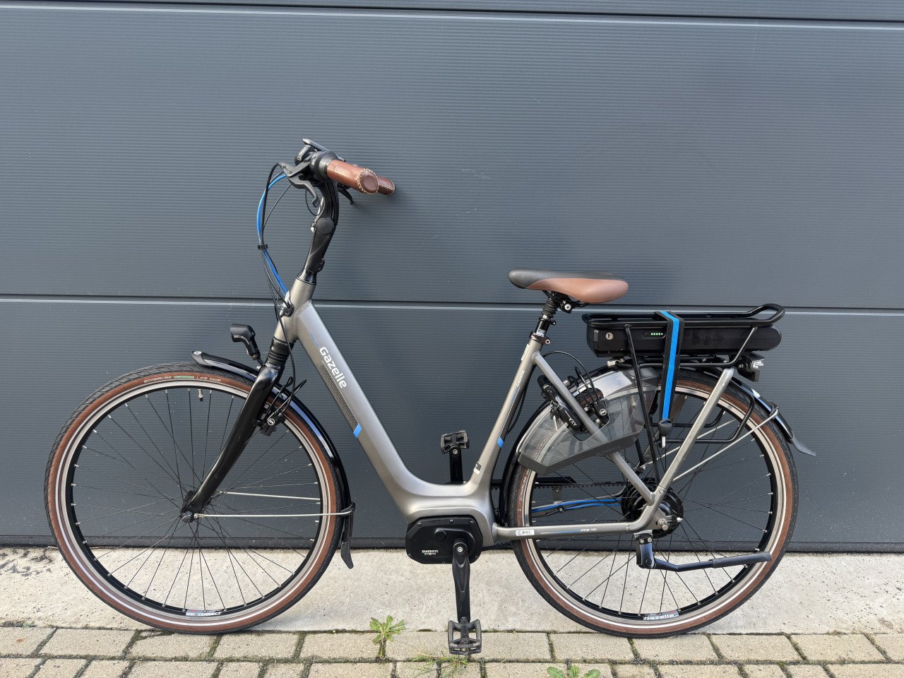 Gazelle Orange C310 middenmoter elektrische fiets belt