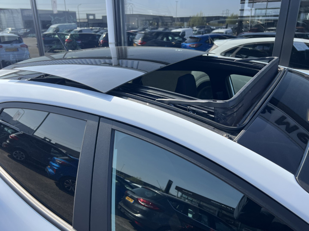 Ford Puma 1.0i ecoboost hybrid 155pk aut st-line , pano dak , winterpack ,