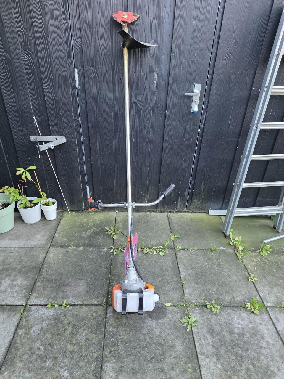 Te koop benzine grasmaaier