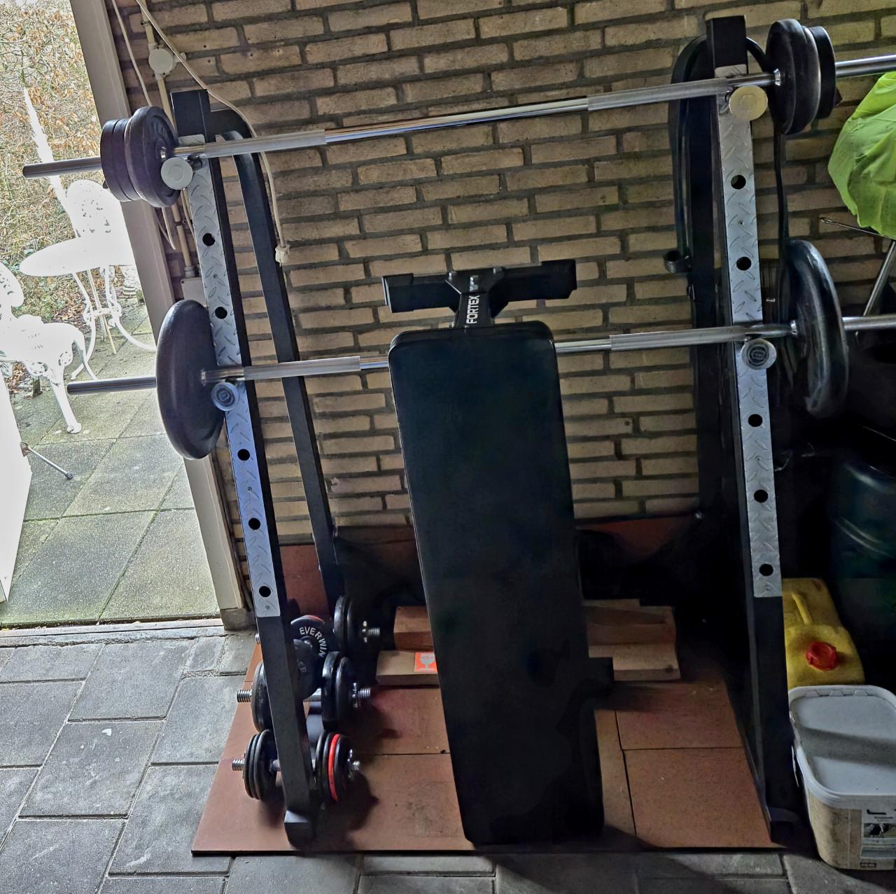 Complete halterset met bankdruk/squatrek
