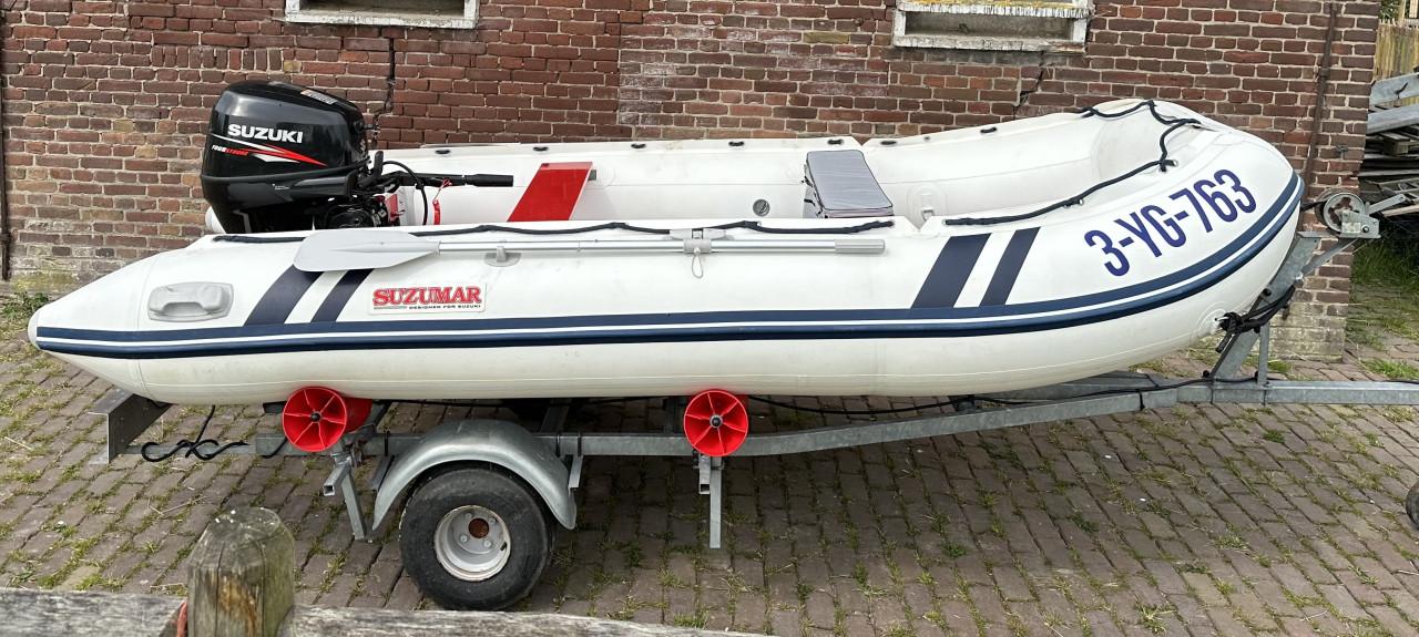 Suzumar 390 + Suzuki 25PK Vtwin & trailer