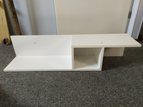 Witte wandplank met vakje