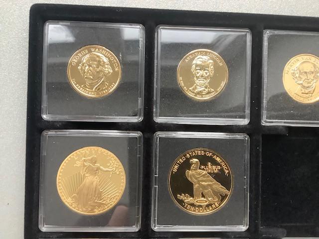 11 penningen / munten USA in luxe houten cassette.