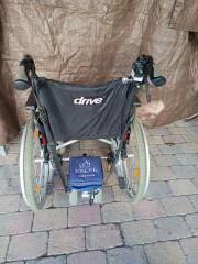 Rolstoel met duwondersteuning