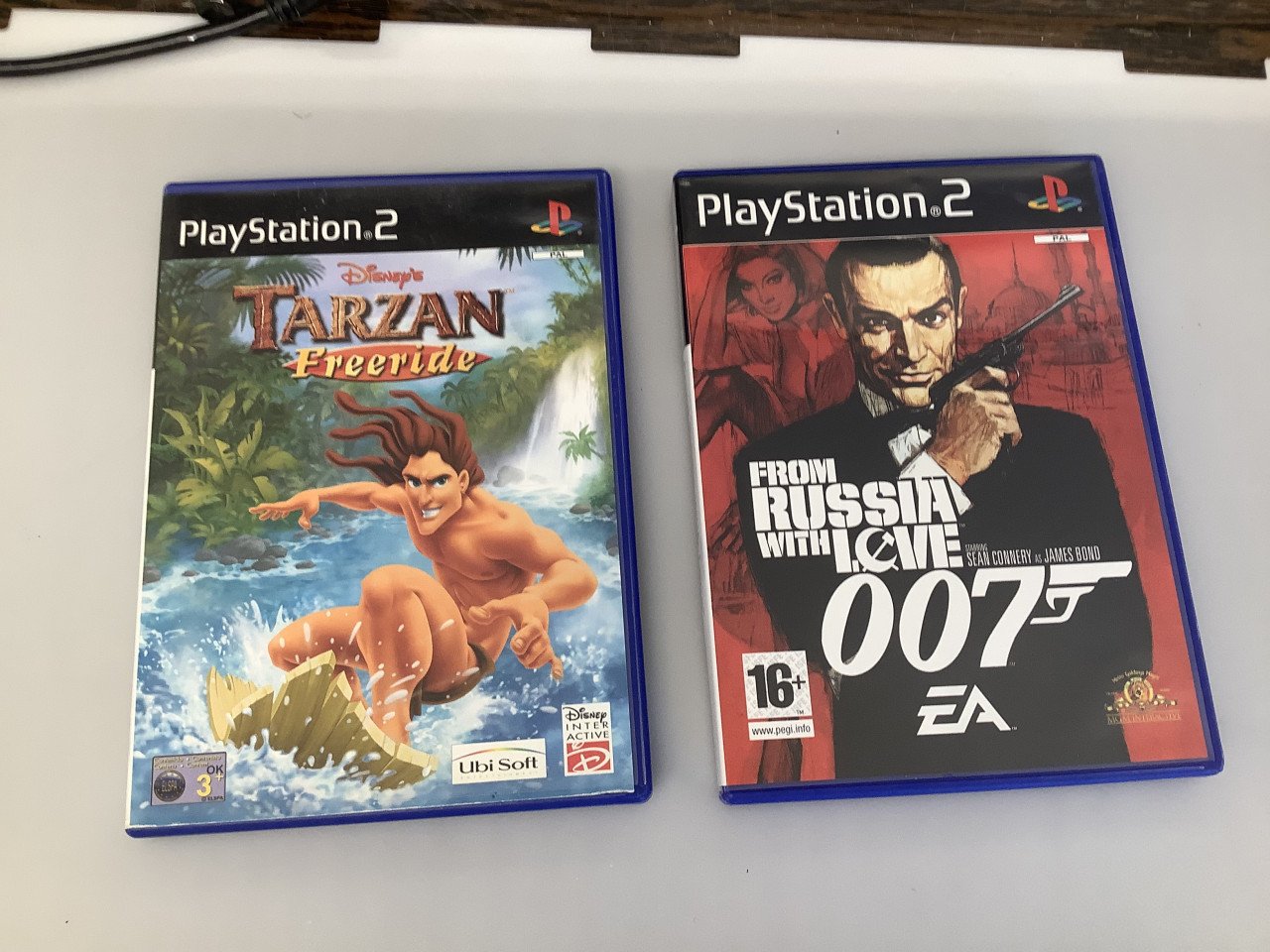 PlayStation 2 slim ( PS2 ) zwart. Met voeding en AV kabel. Met 1 controller